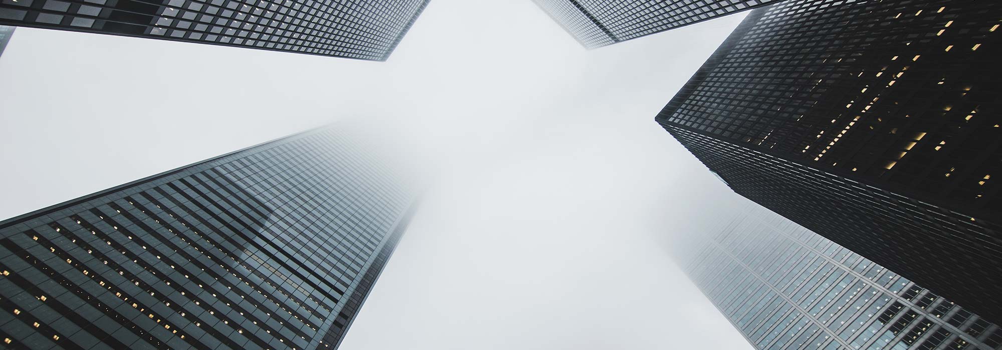 Image of large skyscrapers viewed from below.