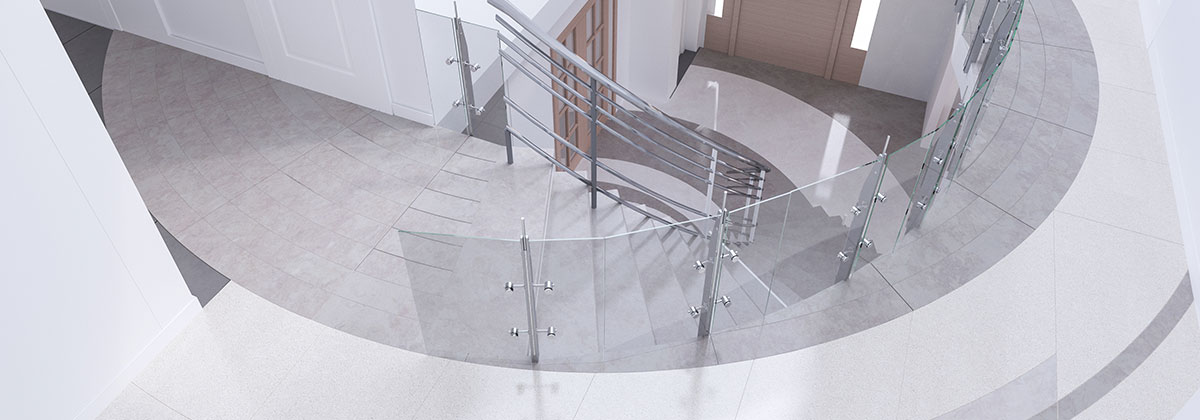 Image of a modern residential front entrances with custom floor tiles looking down from second floor.
