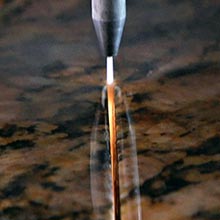 Image of a high-presure water-jet cutting marble.